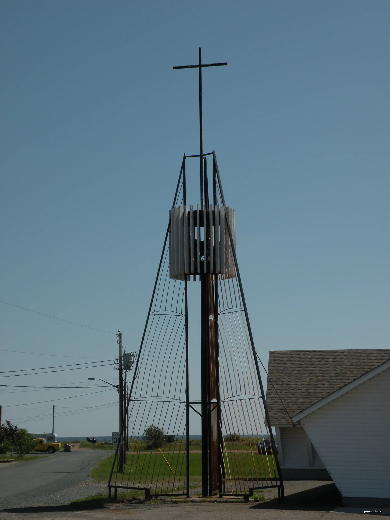 Campanile of the Marie-Médiatrice church in Le Goulet, New Brunswick, Canada. | Autor: Dr Wilson | Licencja: CC BY-SA 3.0 | Źródło: Wikimedia Commons